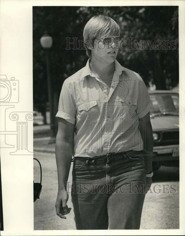 1983 Garron Ray Turk leaving Kerrville Court House - Jones Trial-Historic Images