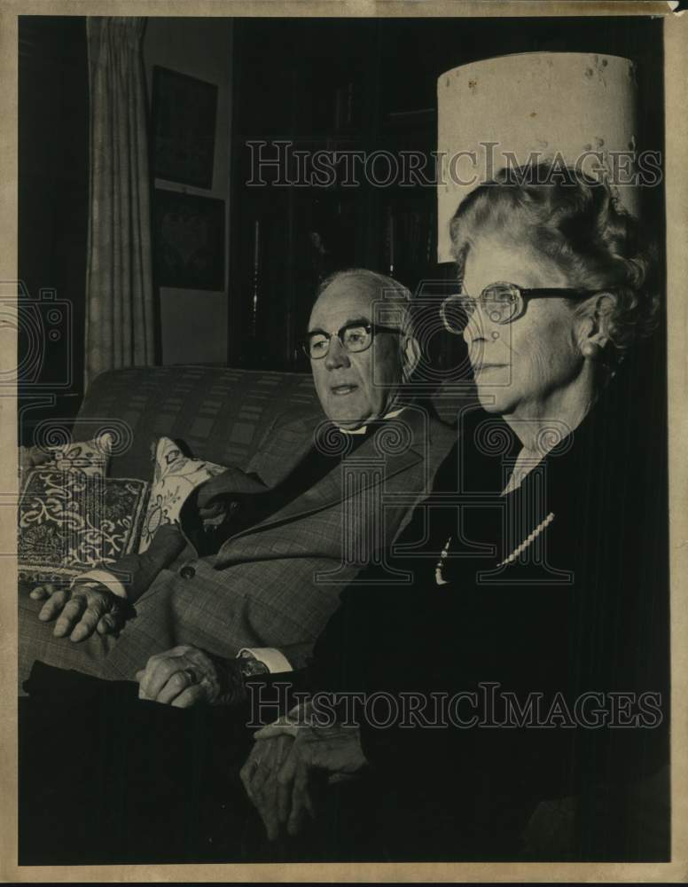 Bishop and Mrs. Everett Jones pose in living room-Historic Images