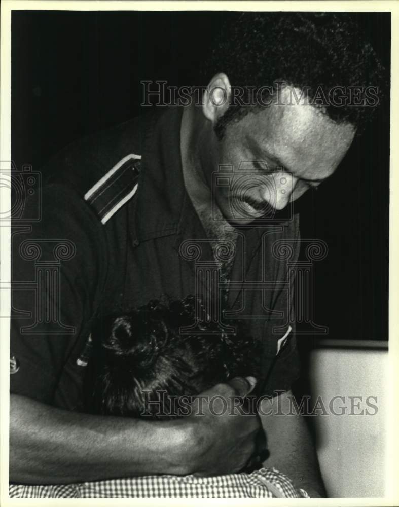 Jesse Jackson comforts woman at Friendship Church, San Antonio-Historic Images