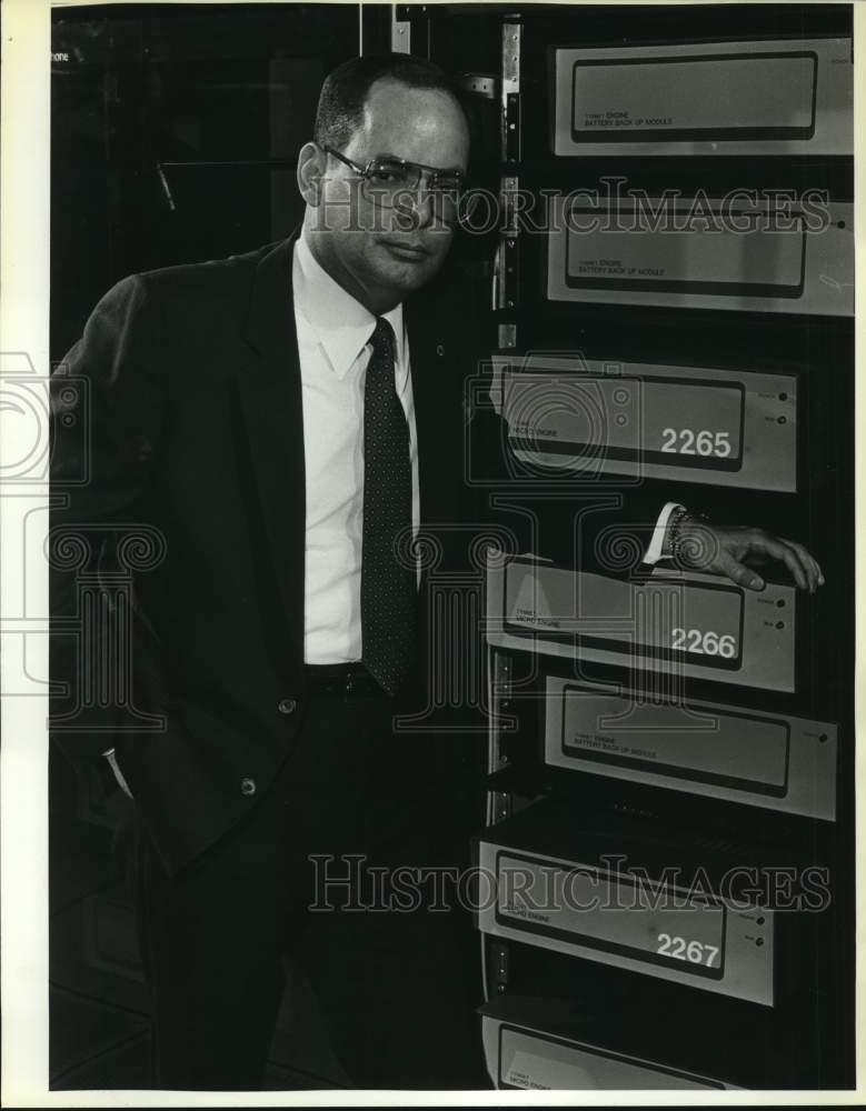 1985 Claude West displays SW Bell packet switching equipment.-Historic Images