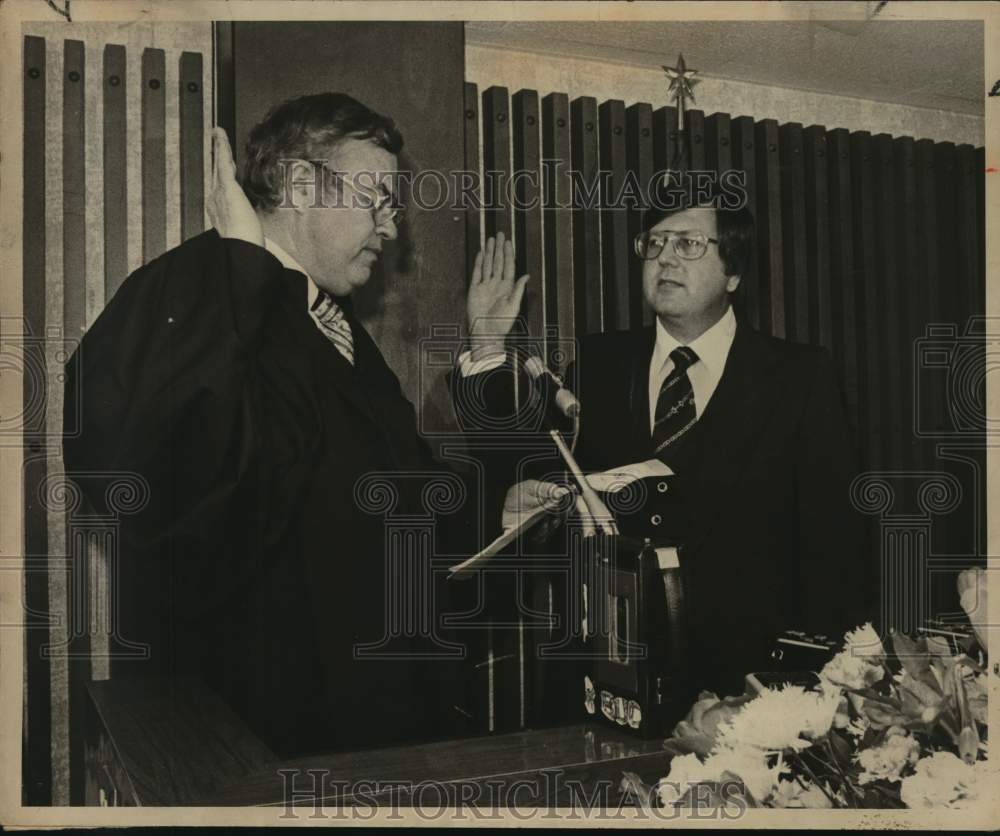 1977 D. J. Bill White, right, sworn in by Judge Ted Butler.-Historic Images