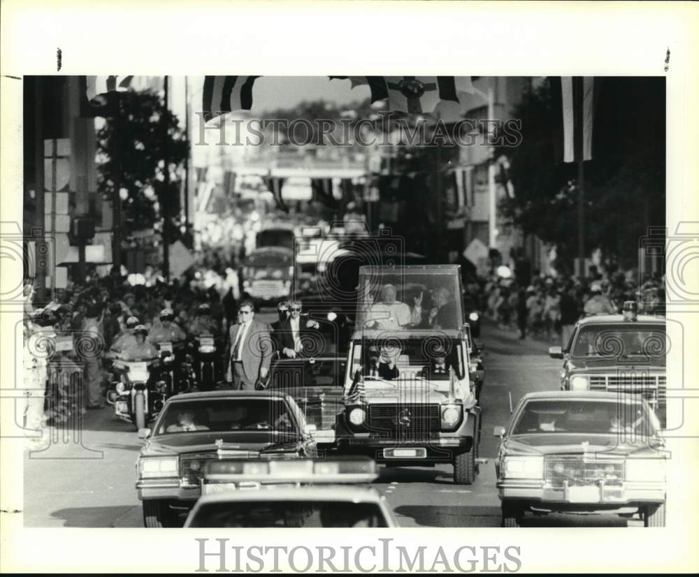 Pope waves during parade route on Lexington.-Historic Images