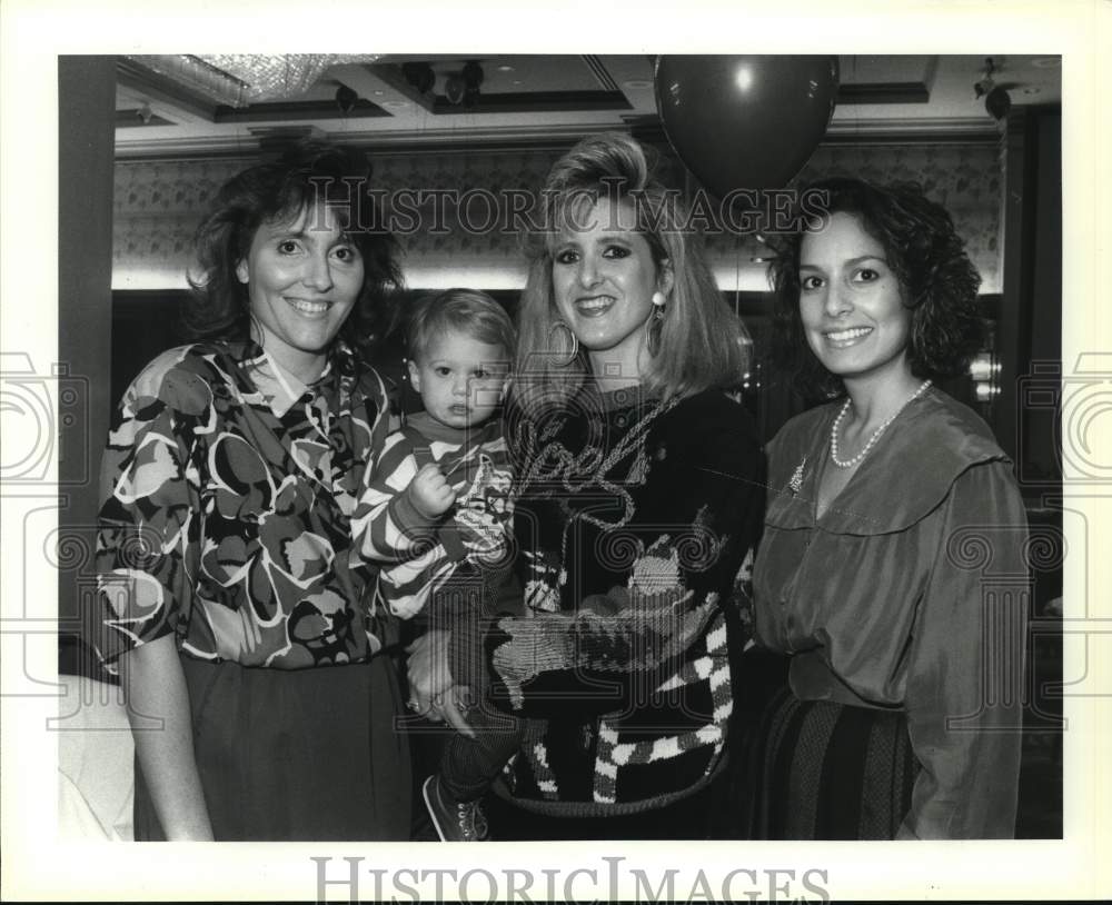 1991 Ronda Harrison and guests of Any Baby Can Inc., Christmas party-Historic Images