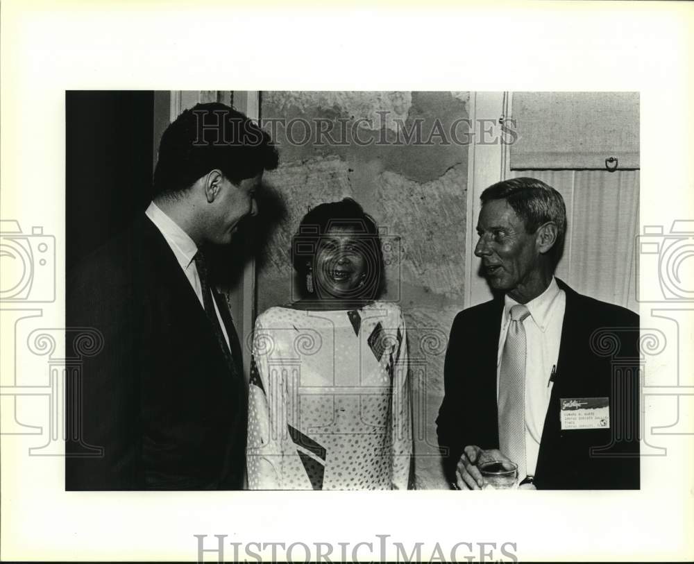 1987 Jose and Gloria Lozano with Edward Harte attends IAPA event-Historic Images