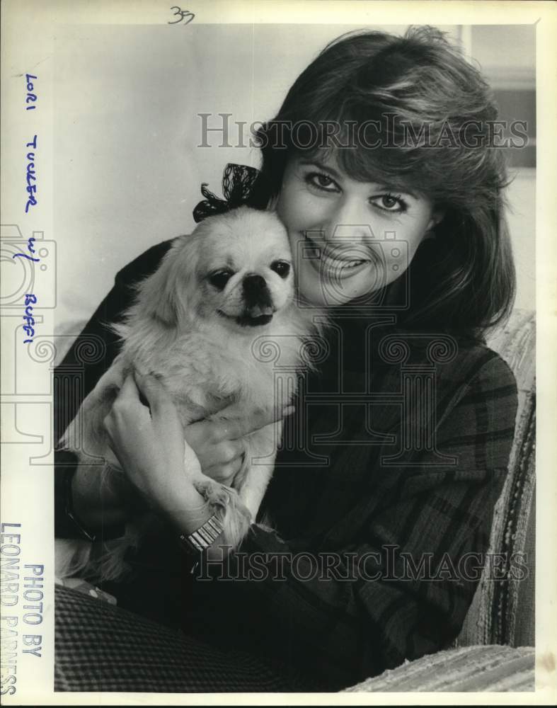 Lori Tucker, news anchor, with Buffie-Historic Images