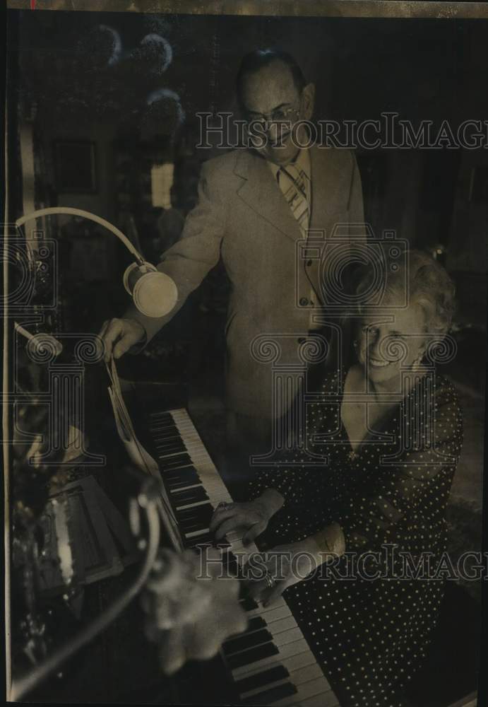 Colonel (ret) and Mrs. Samuel Hurwitz pose at piano-Historic Images