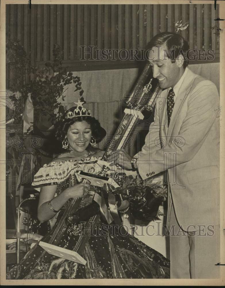 1977 Henry Cisnero awarding Francis Casilas, Queen of Lilac Council-Historic Images