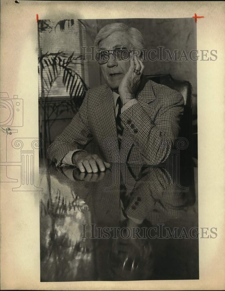 1982 Dr. Harold Hitt sitting at his desk, Texas-Historic Images