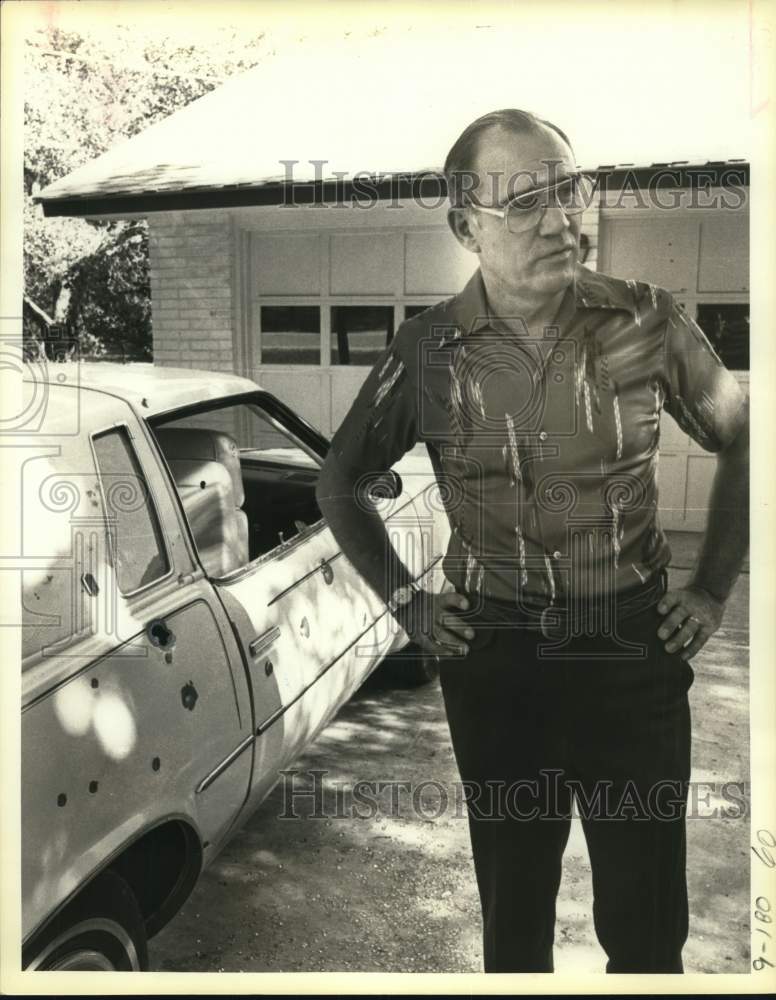 1983 Ex police chief Robert Heuck with his bullet riddled car, Texas-Historic Images