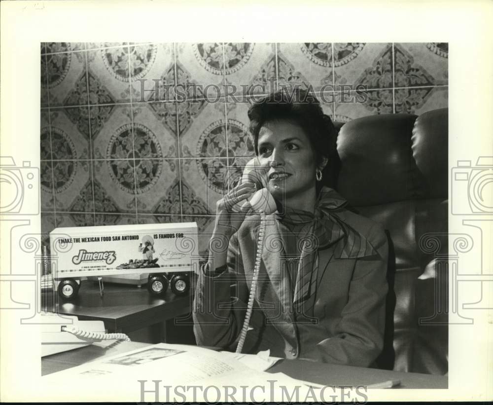 1983 Mary Alice Cisneros sitting at her desk, Texas-Historic Images