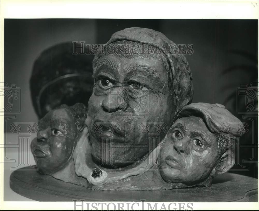 1991 Sculpture of adult and children&#39;s heads by artist Paul Hurd-Historic Images