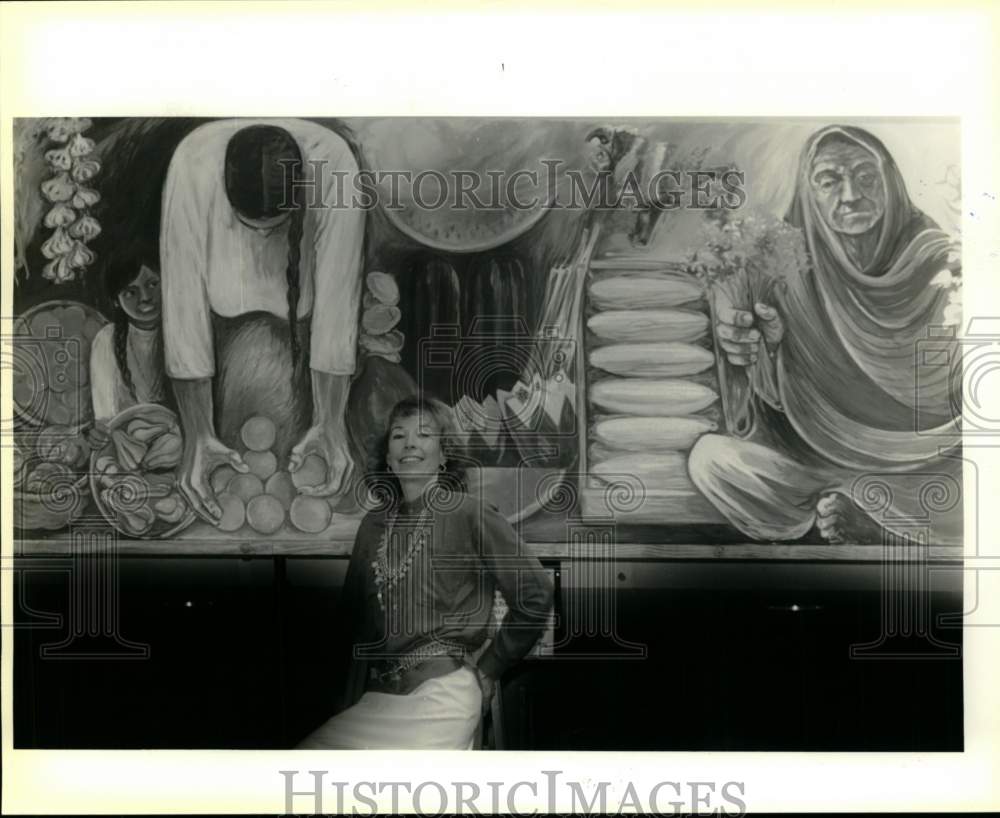 1989 Artist Jacqui Von Honts stands next to mural at festival-Historic Images