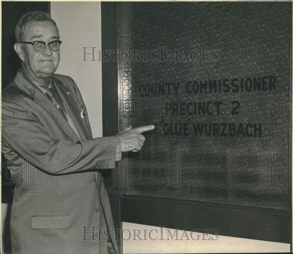 Ollie Wurzbach Points To His Name On County Commissioner Sign-Historic Images