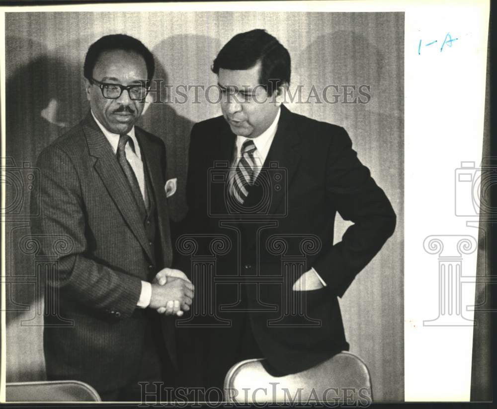 1984 Thomas Gaffney congratulates new President Oscar Hernandez-Historic Images