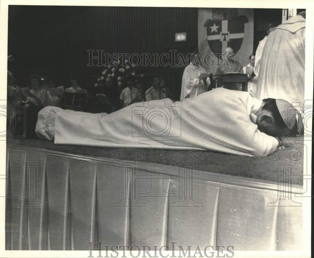 New Bishop Charles Grahmann prostrates at La Villita ceremonies-Historic Images