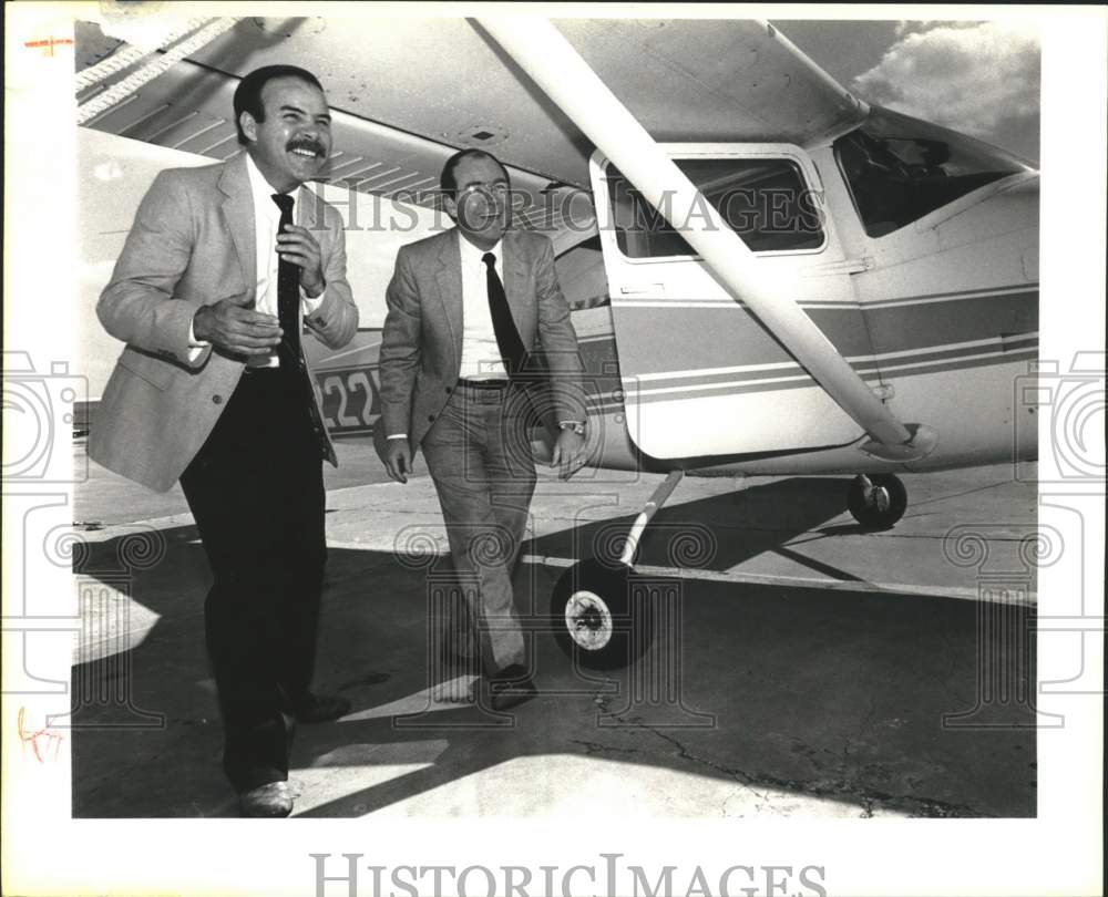1990 Captain Jimmy Kopac, SAPD, inspects donated airplane-Historic Images