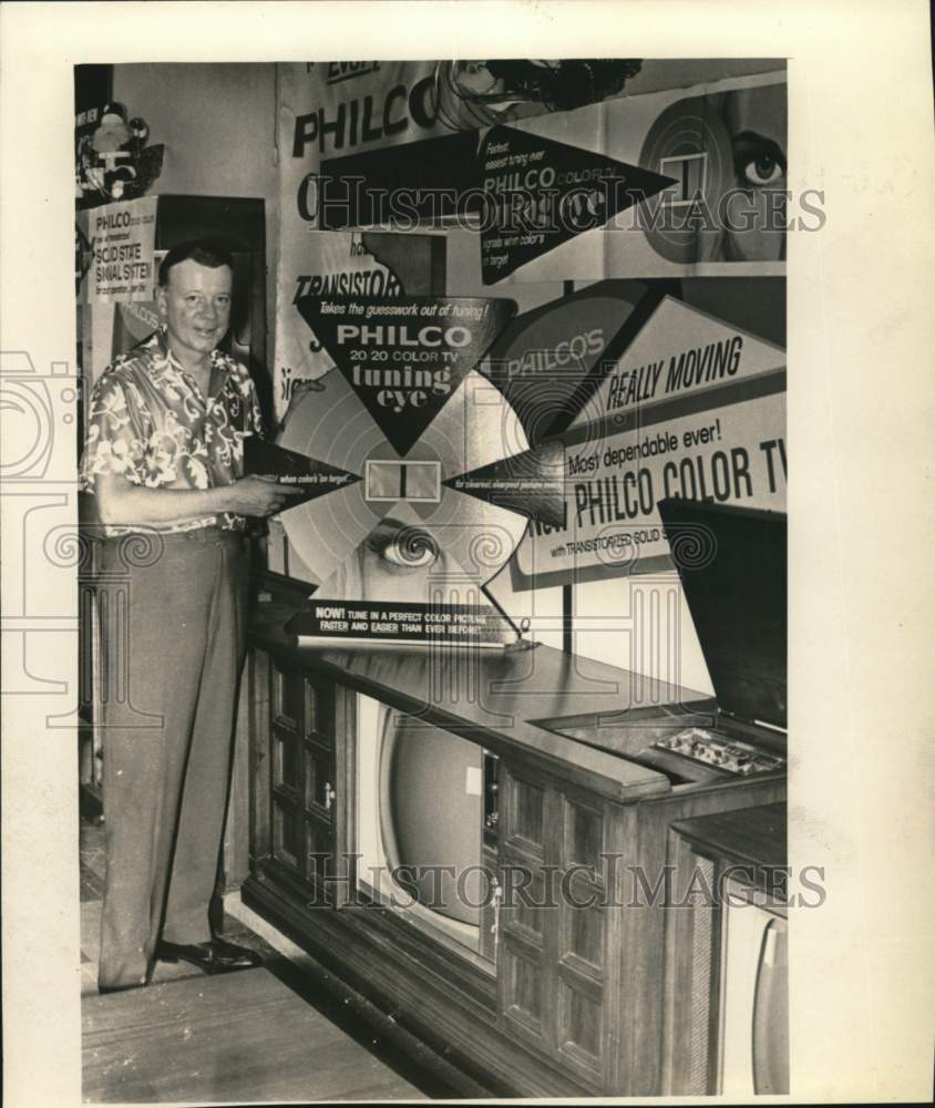 1966 Philco's sales manager Robert Howe points to color console-Historic Images