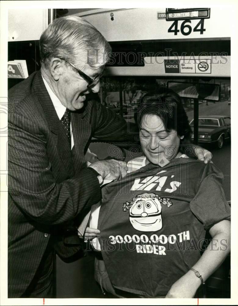 1984 Paul Herder awards Manuela Hernandez 30,000,000th rider shirt-Historic Images