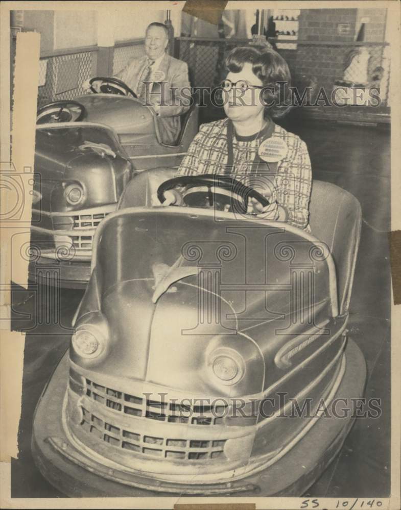 1975 Lila Cockrell with unidentified man ride in &quot;bumper cars.&quot;-Historic Images