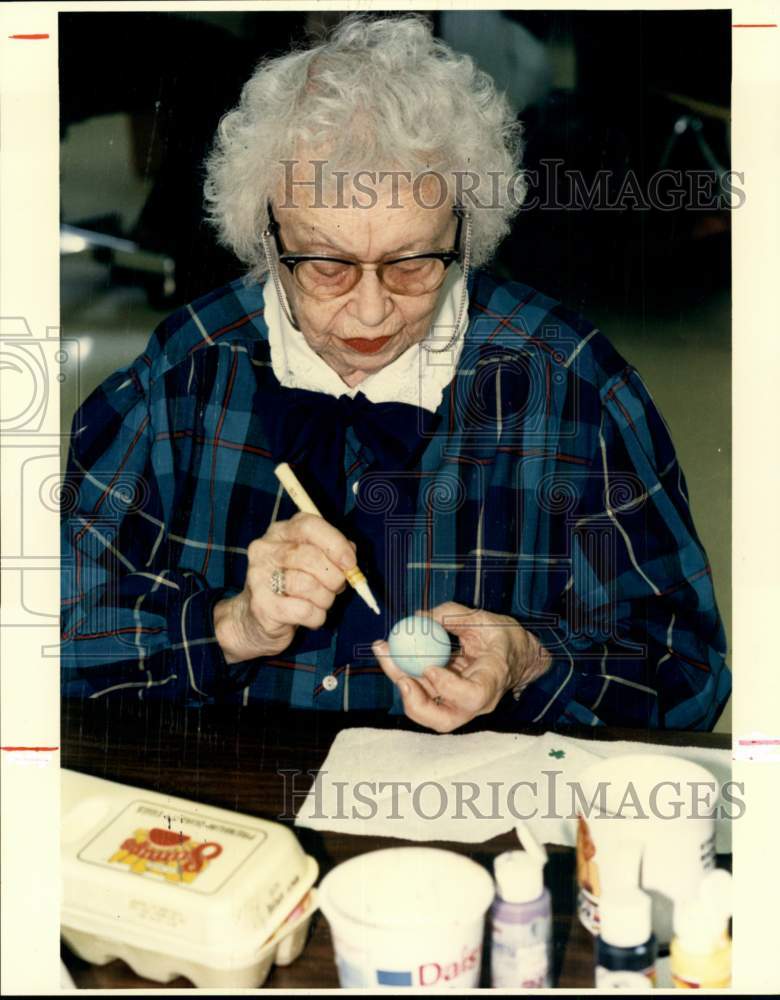 1994 Alice Baker painting Easter eggs, Texas-Historic Images
