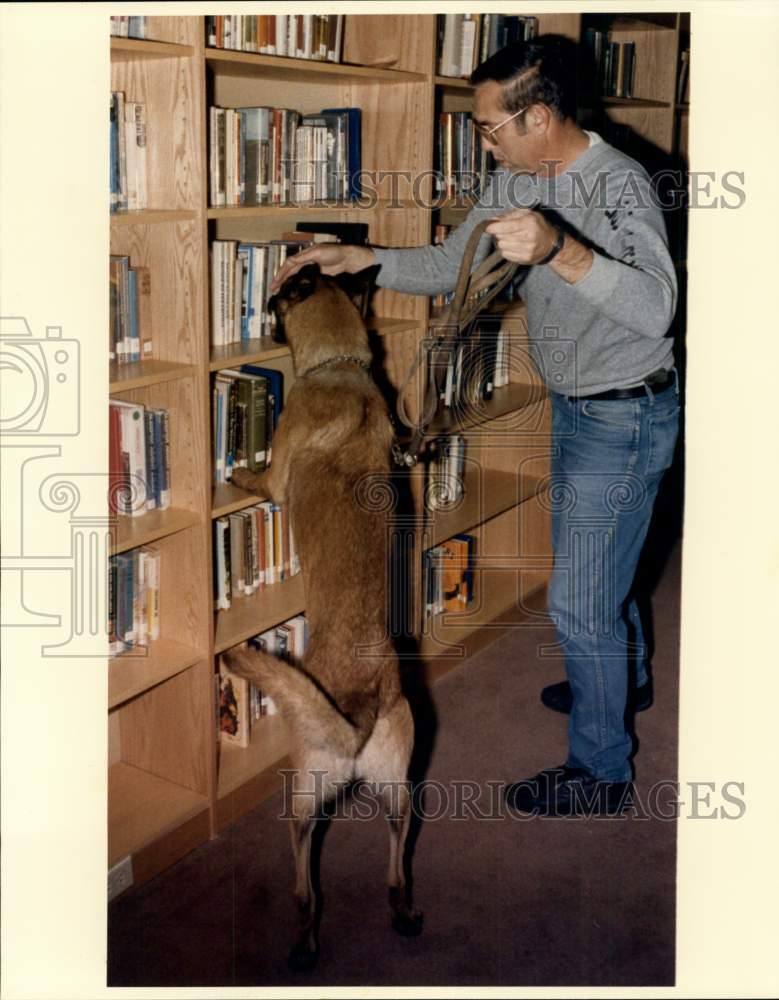 Dan Hagter with Tomas, a drug sniffing dog, Texas-Historic Images