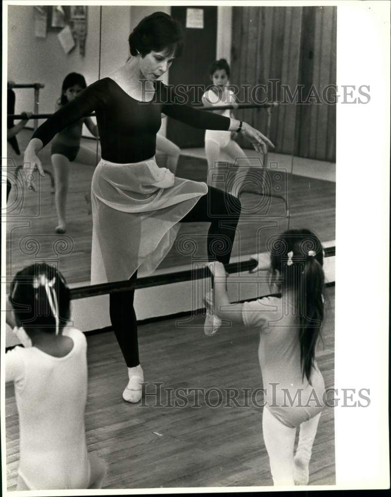 1985 Joyce Baker Knapick working out on a ballet bar, Texas-Historic Images