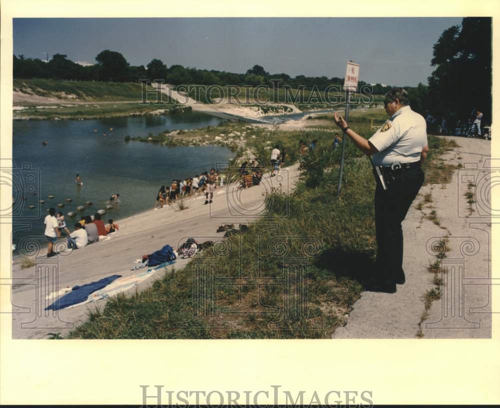 1993 Park Ranger Ralph Reyes attempts to get swimmers from river.-Historic Images