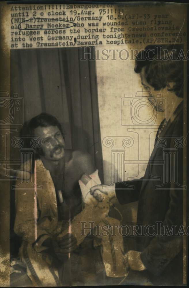 1975 Wounded pilot at Bavarian hospital news conference-Historic Images