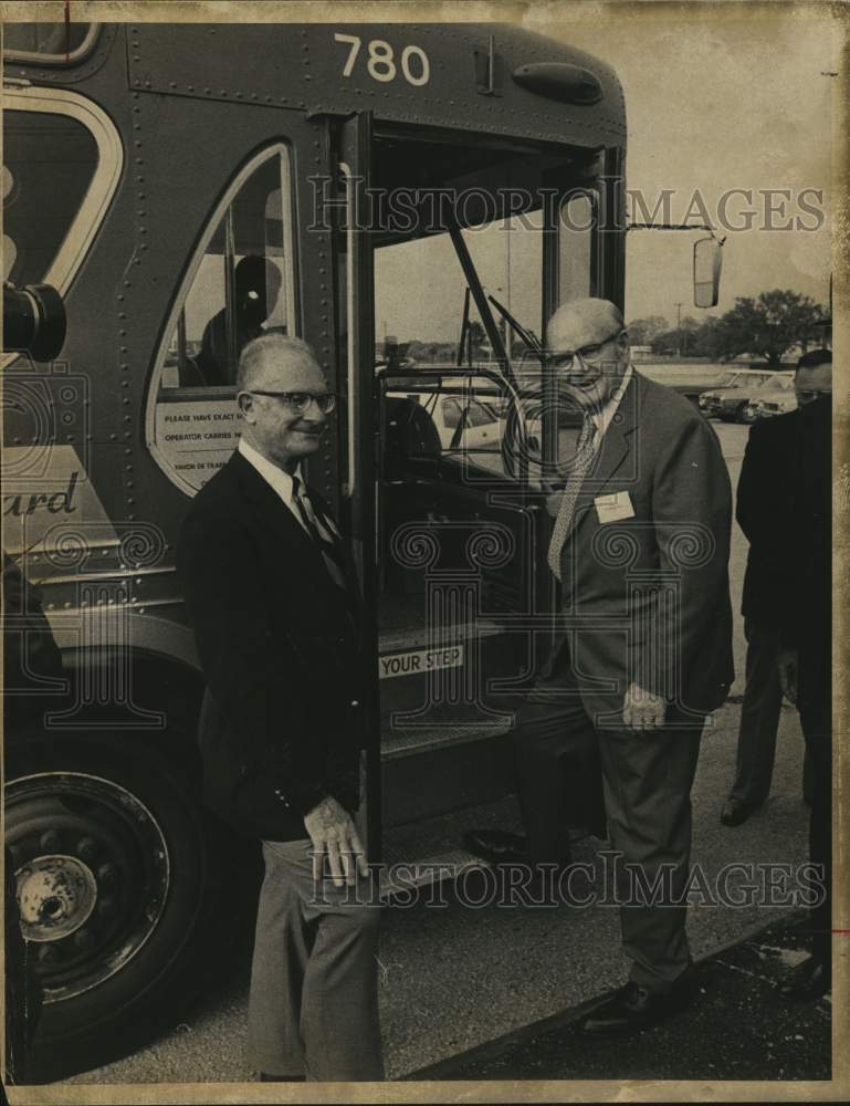 1974 Norman Hill with G. S. McCreless at door to bus-Historic Images