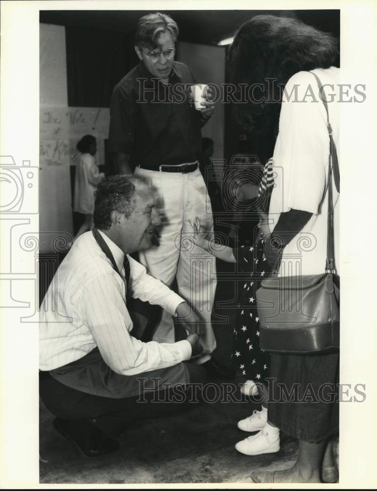 1993 Bob Krueger talks to Maricela Rios with parents Susan &amp; Roland-Historic Images
