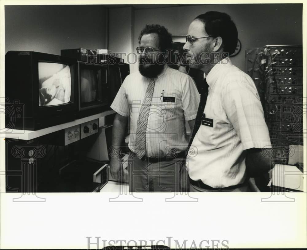 1988 Doctors view sleep monitor at U.T. Health Science Center, Texas-Historic Images