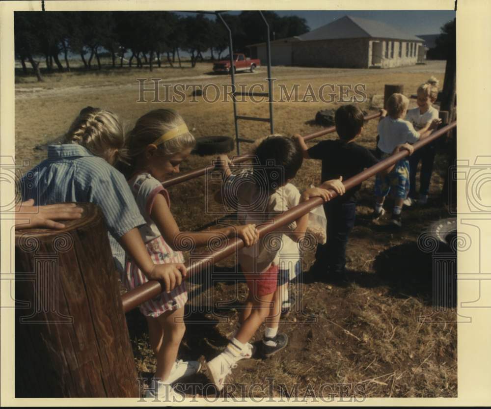 1988 Divide Elementary School students during recess, Texas-Historic Images