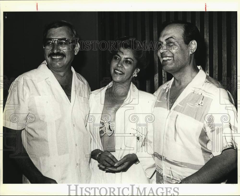 1968 Jose Medellin with Rosalie and Johnny Gabriel pose at event-Historic Images