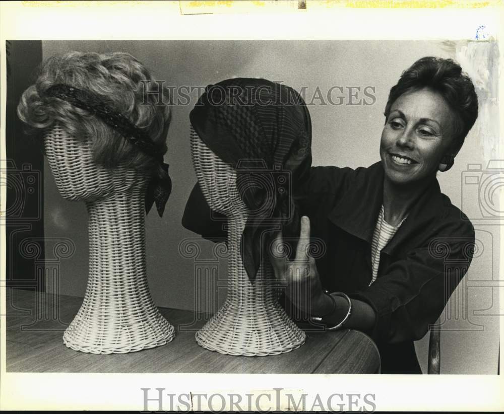 1986 Jean Martin with display of wigs and scarves, Texas-Historic Images