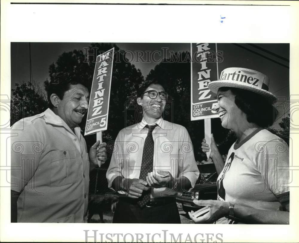 1985 Walter Martinez with his parents outside polls, Texas-Historic Images