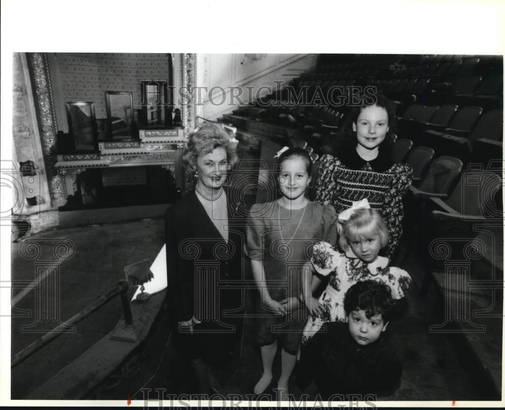 1994 Charline McCombs with her grandchildren in the Empire Theater-Historic Images