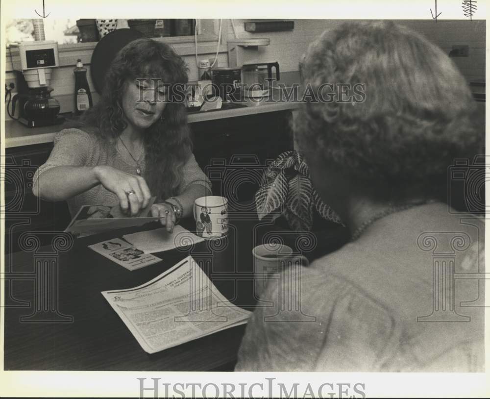 1988 Ruth Lyle with client at United Way's Family Outreach Center-Historic Images