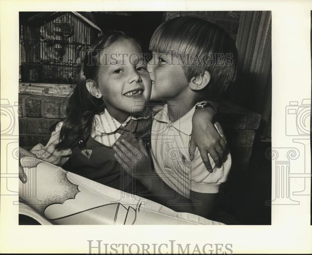 1985 Stephanie Mileager saves brother Brian, 6, from drowning, Texas-Historic Images