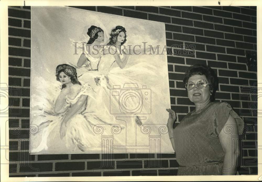 1987 Chris Costner Sizemore, with painting of three women, at home-Historic Images