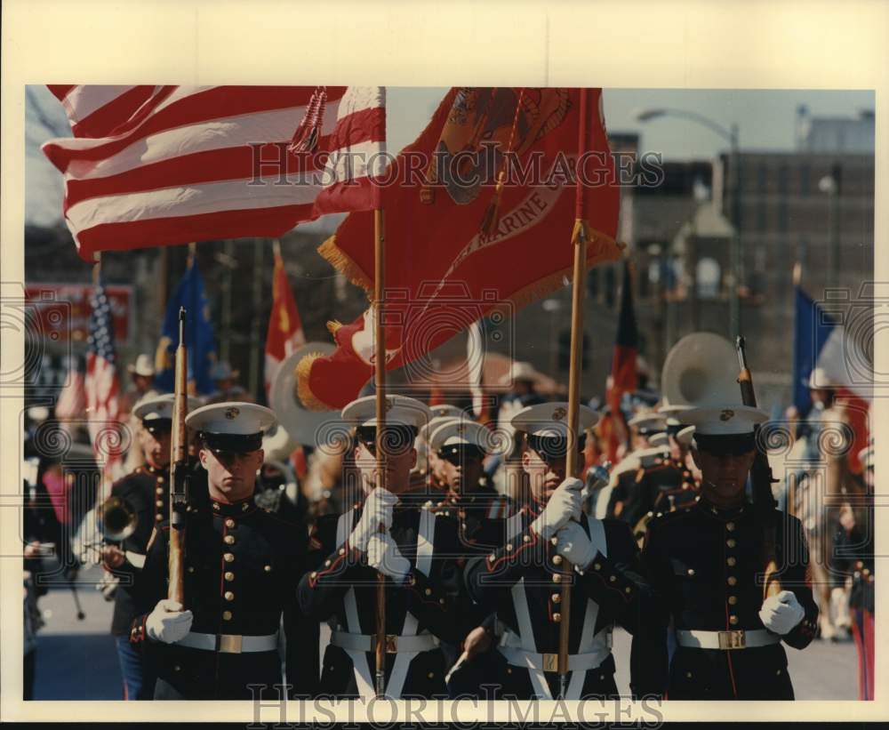 1988 Press Photo Marine Corp Military Academy color guard leads rodeo parade, TX - Historic Images