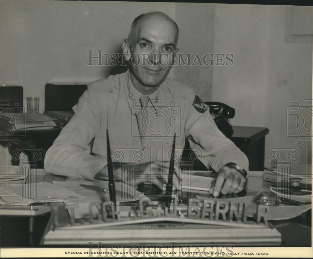 Lieutenant Colonel G. J. Garner sitting at his desk, Texas-Historic Images