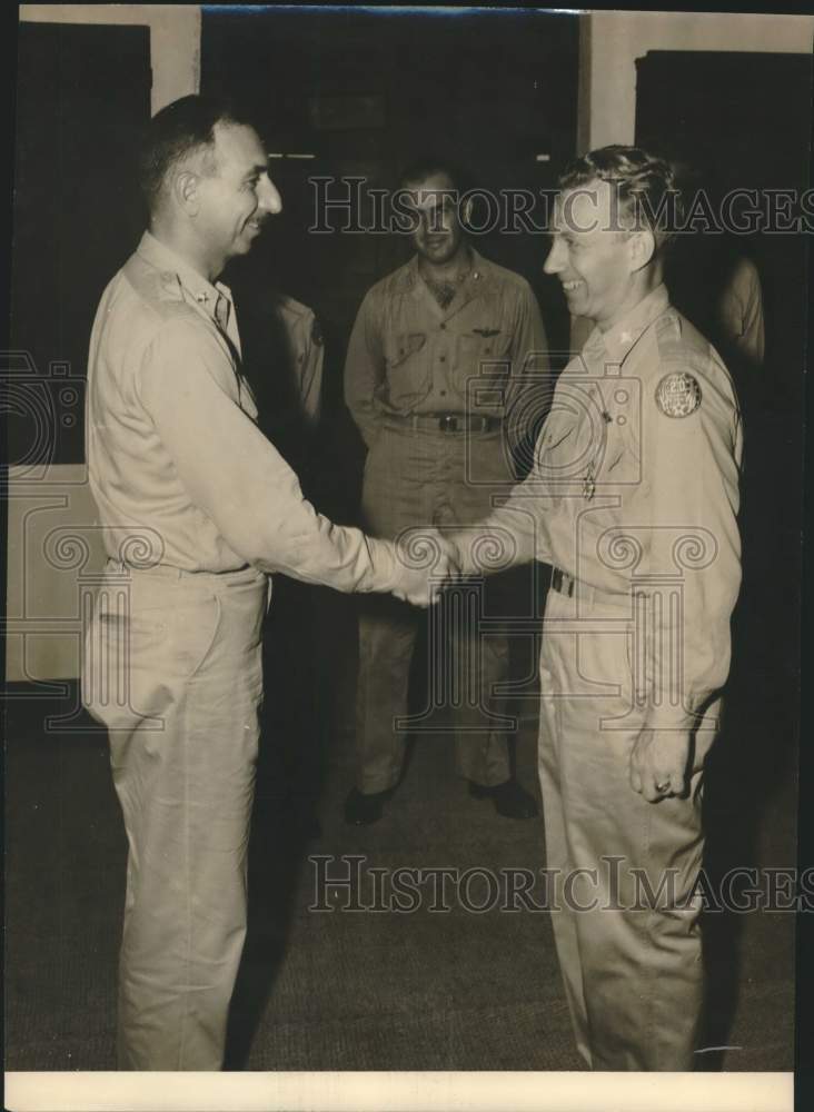 Colonel Victor L. Anderson shaking hand with gentleman-Historic Images