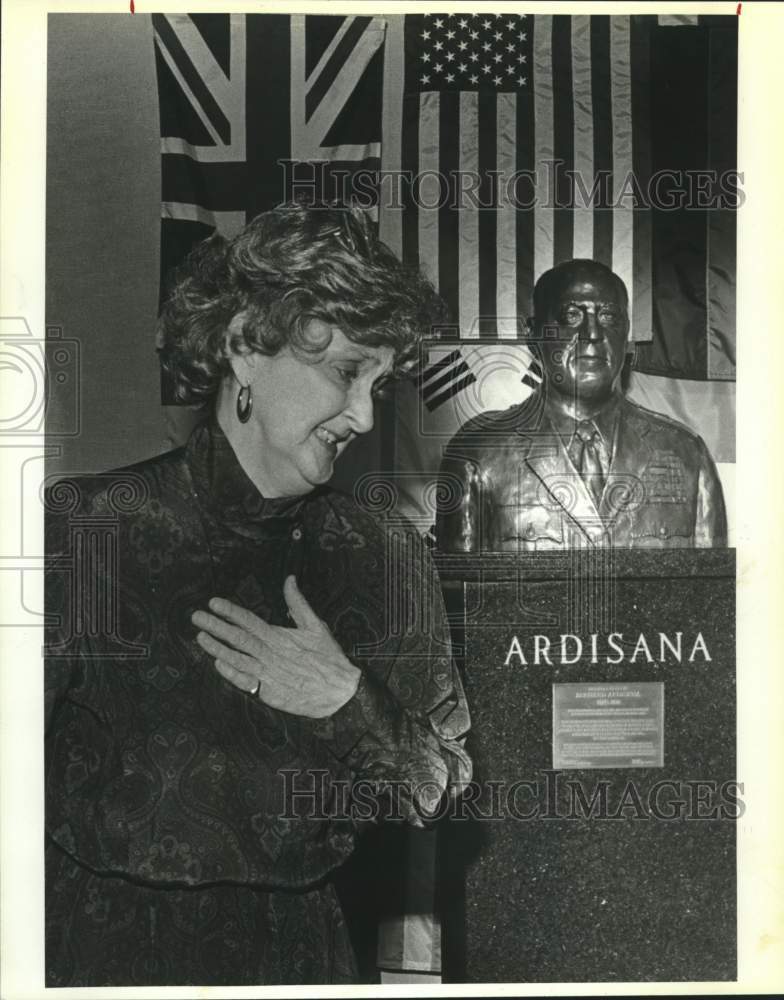 1987 Betty Ardisana with bust of Brig. Gen. Bernard Ardisana, Texas-Historic Images