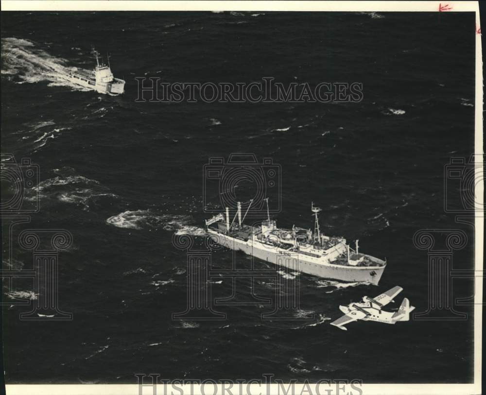 Press Photo Airplane Flying Over Coast Guard Ships in Ocean - sam05091 - Historic Images