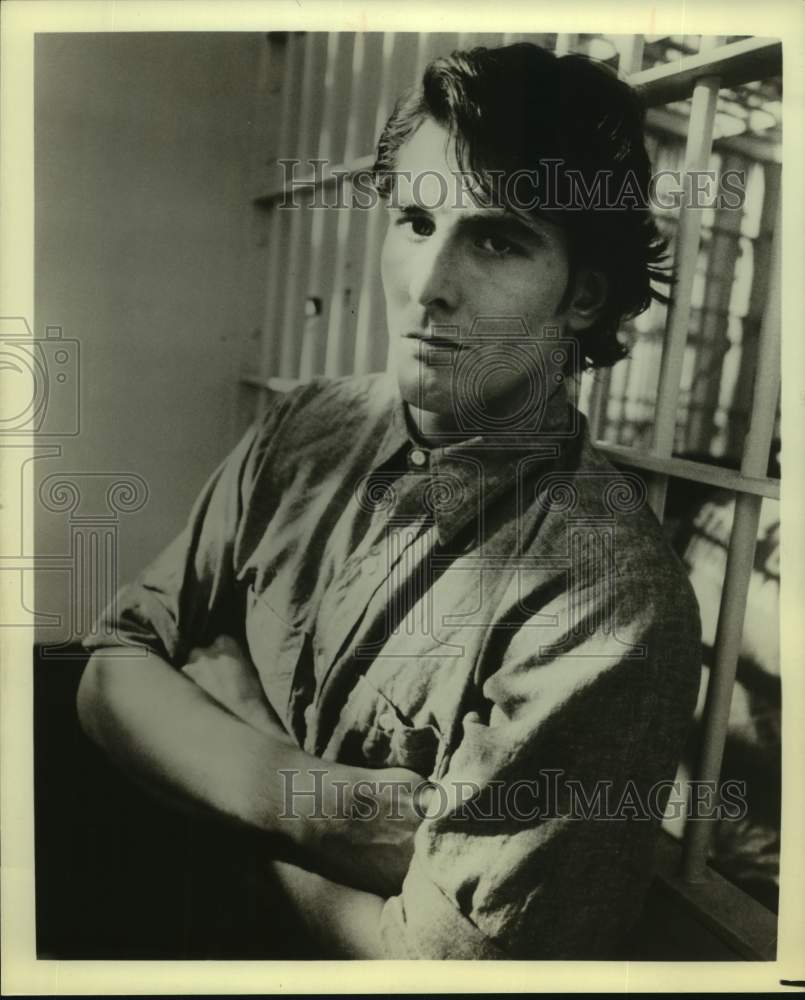 Press Photo Actor John Laughlin in jail cell scene - Historic Images