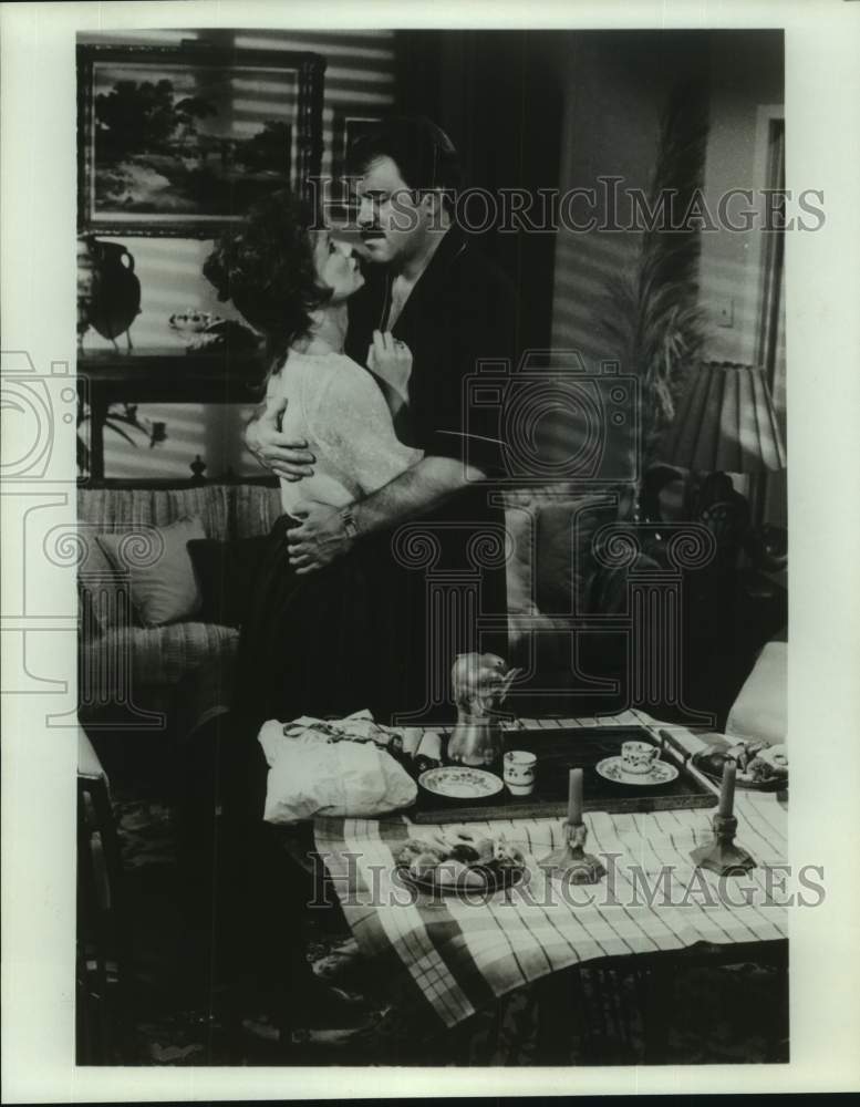 Press Photo Actress Sheila McRay embraced by co-star during scene - Historic Images