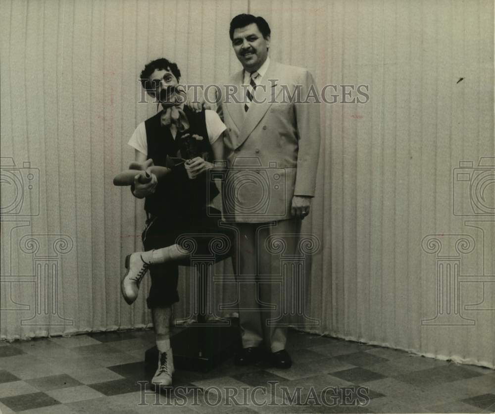 1957 Press Photo Entertainers Tio Laureano and Zata Rain standing and smiling - Historic Images