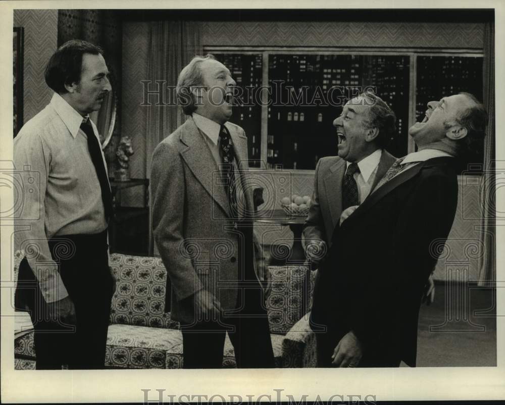 Actor Bill Macy with laughing co-stars in television show scene - Historic Images
