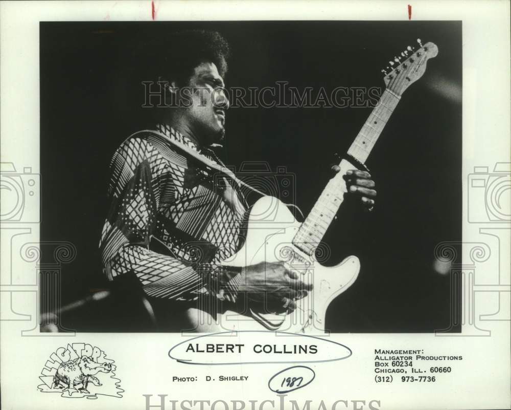 1987 Press Photo Musician Albert Collins performs on guitar during performance- Historic Images