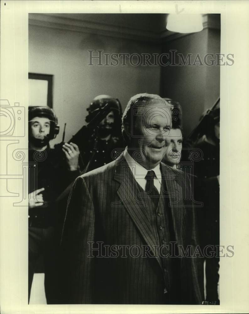 Actor Ned Beatty with co-stars in movie scene - Historic Images